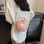 Heart-shaped embroidered handbag