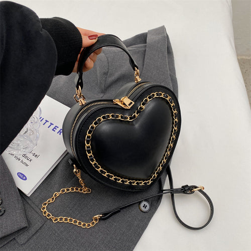 Heart-shaped embroidered handbag