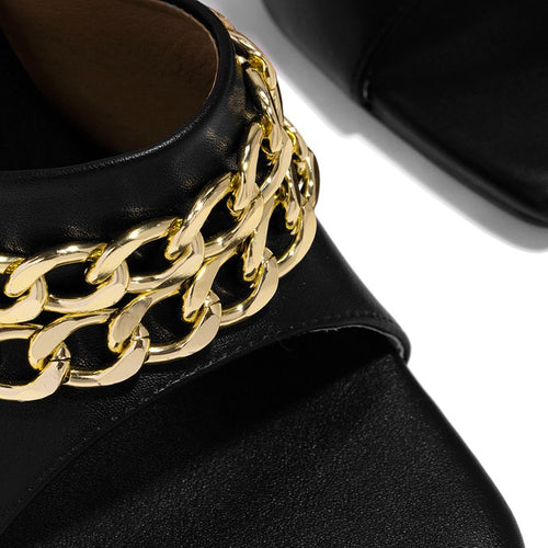 Heeled shoes with chains