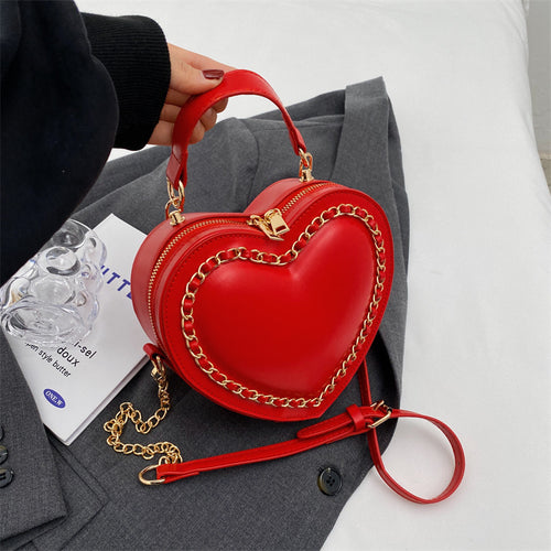 Heart-shaped embroidered handbag