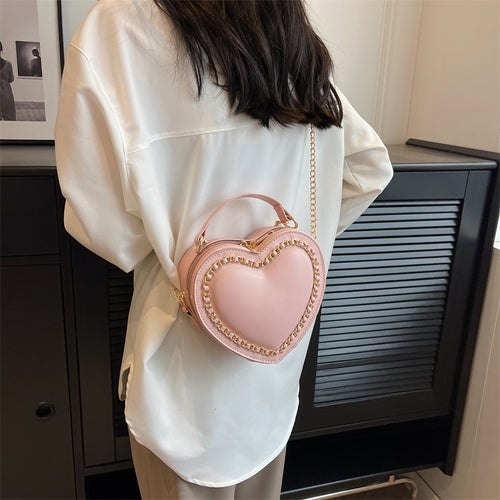 Heart-shaped embroidered handbag
