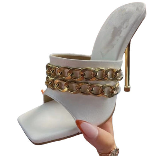 Heeled shoes with chains