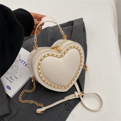 Heart-shaped embroidered handbag