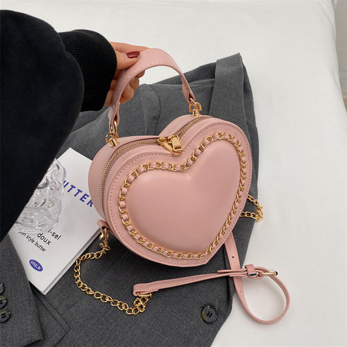 Heart-shaped embroidered handbag